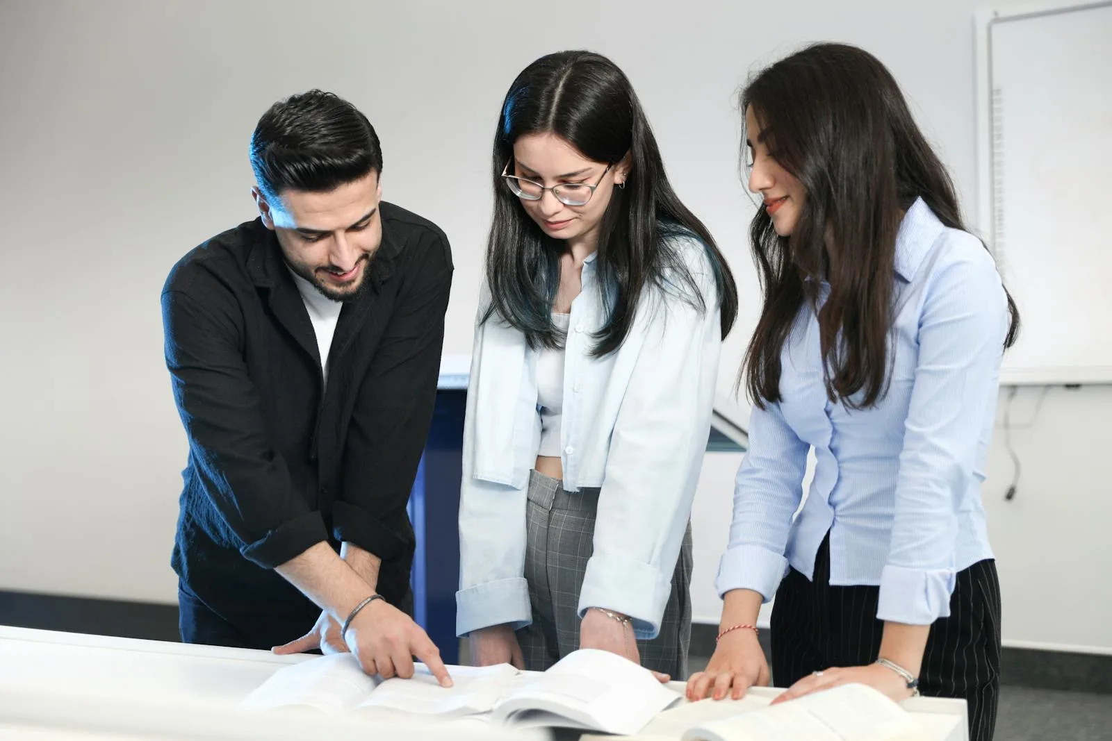 Three adult who are possible recipient of a research grant